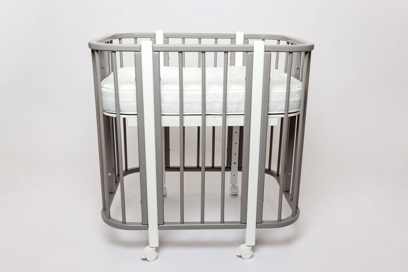 Кроватка КАРАМЕЛЬ с комплектом матрасов и маятником 5