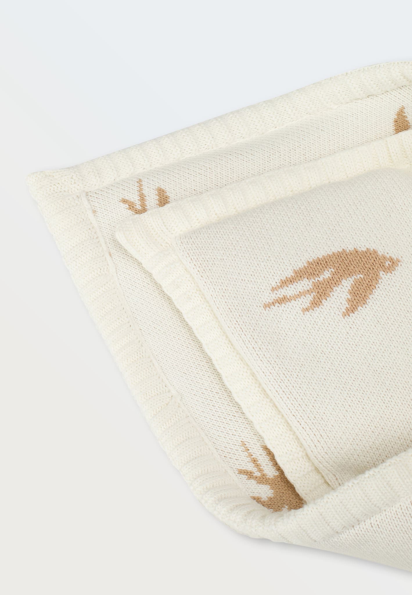 Плед-конверт вязаный Toucankids (90*90) 2 ласточки